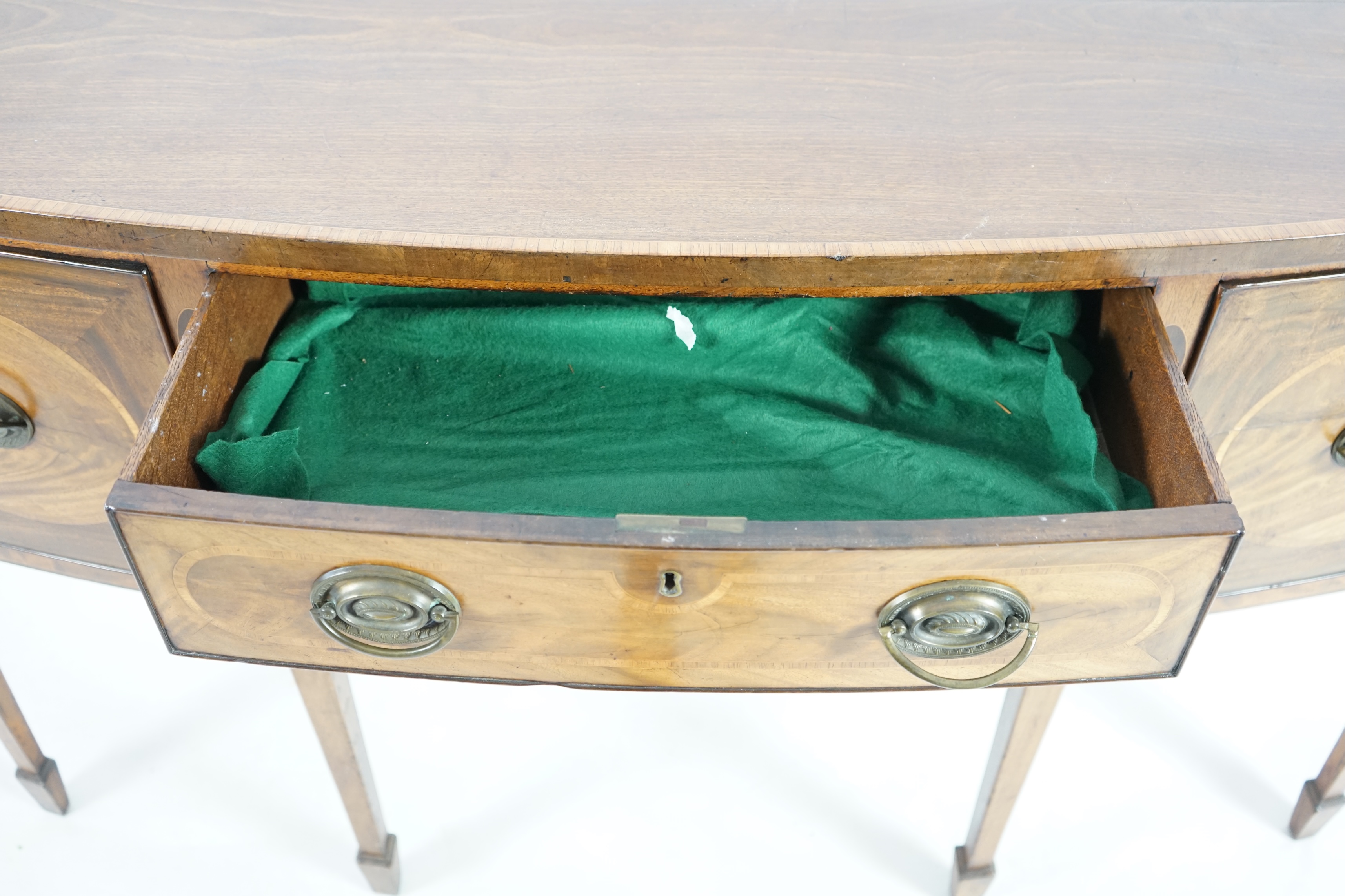 A George III rosewood banded mahogany bowfront sideboard